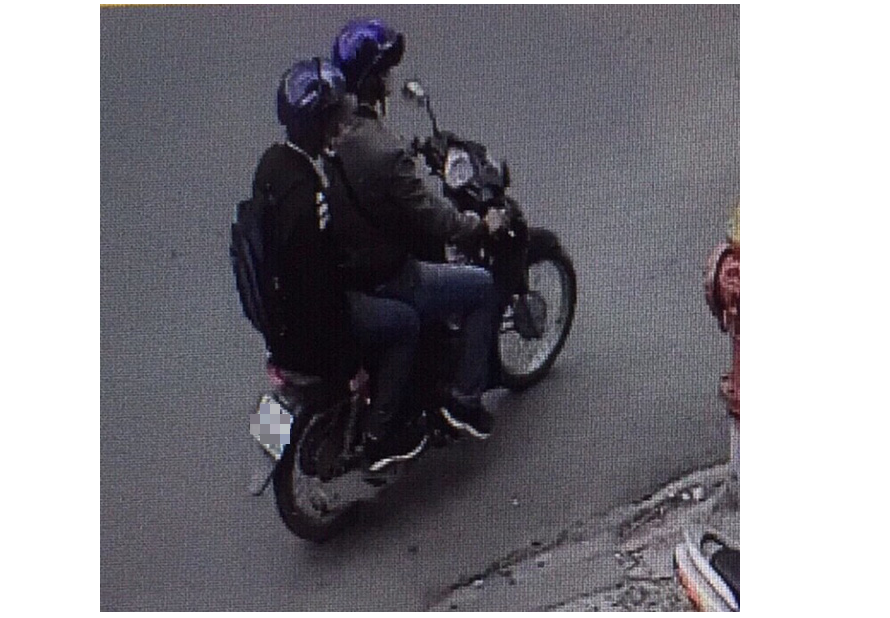 Công bố hình ảnh 2 nghi phạm ném vật nổ vào cơ quan công an