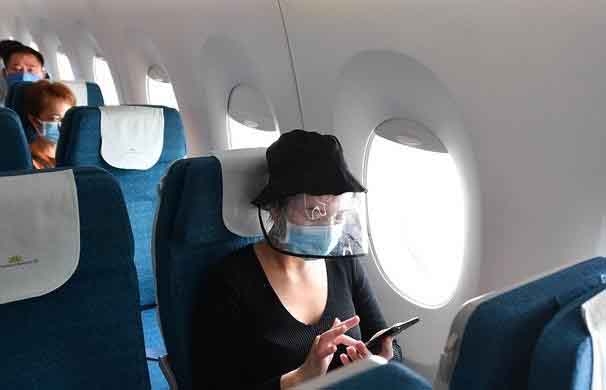 Bí quyết hạn chế nguy cơ bị lây nhiễm COVID-19 khi đi máy bay